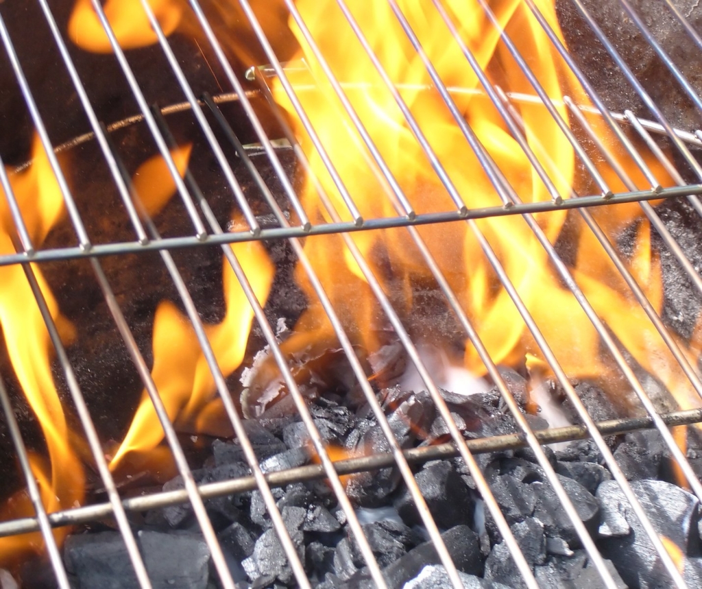 Charcoal grill on fire